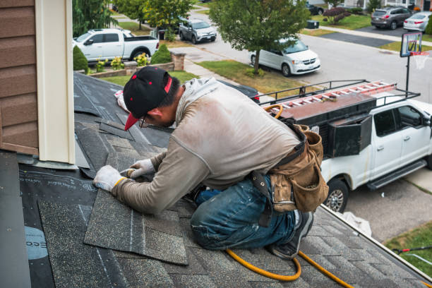 Professional Roof Replacement technician working in Vida, OR
